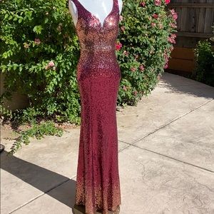 Beautiful burgundy and gold sequence dress.